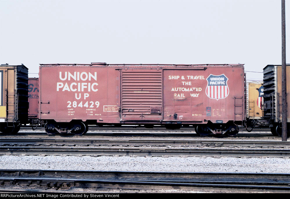 Union Pacific company sand car UP #284429. Hatches on top.